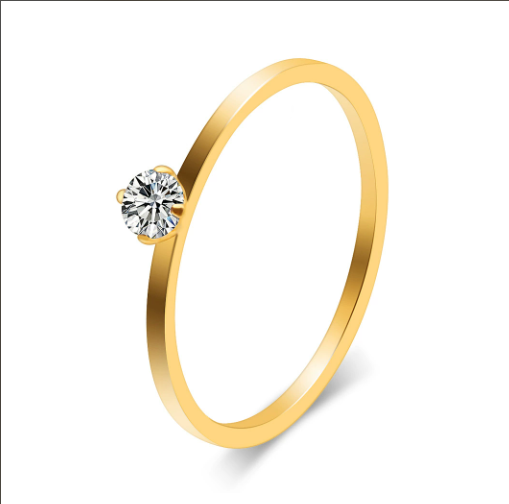 Bague Élisa en acier inoxydable, fine et élégante, ornée d’une pierre brillante. Disponible en or et argent. Résistante à l’eau, hypoallergénique.